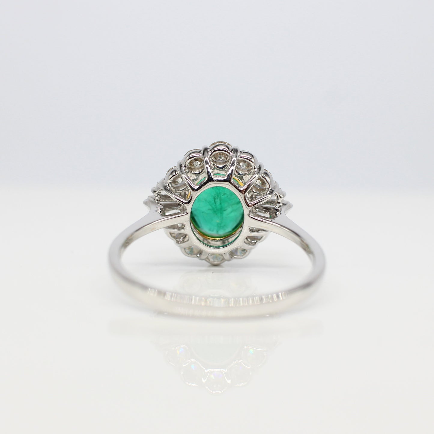 18K EMERALD & DIAMOND HALO RING