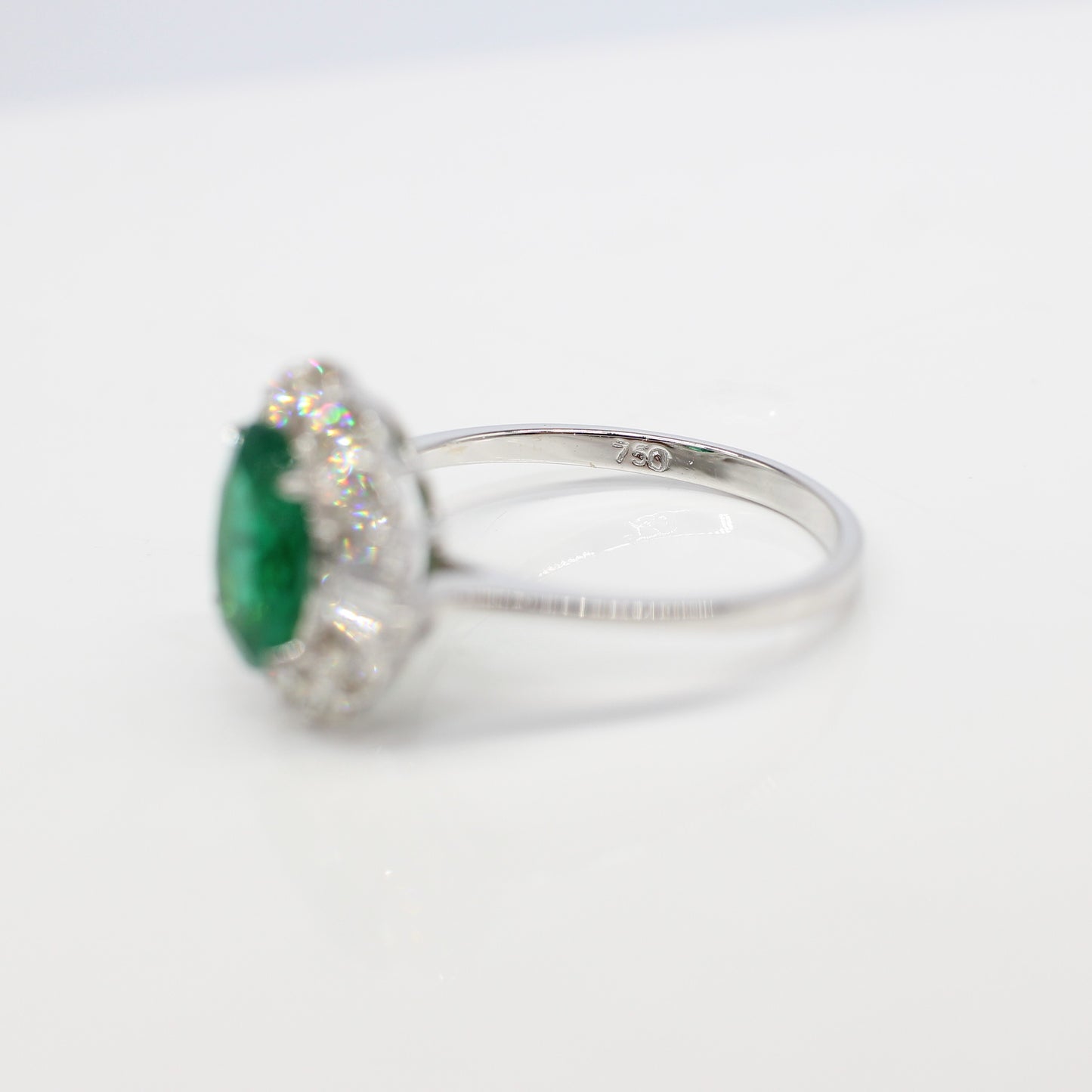 18K EMERALD & DIAMOND HALO RING