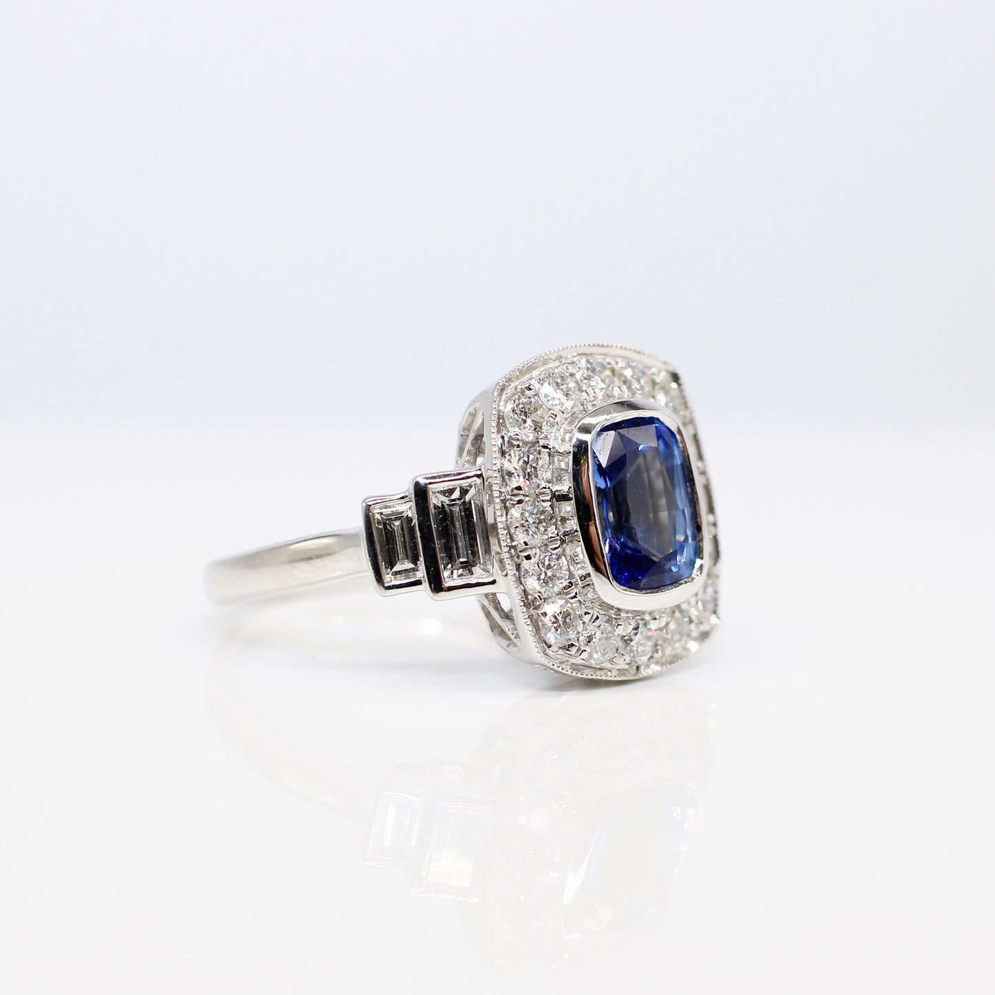 PLATINUM SAPPHIRE & DIAMOND ART DECO HALO RING