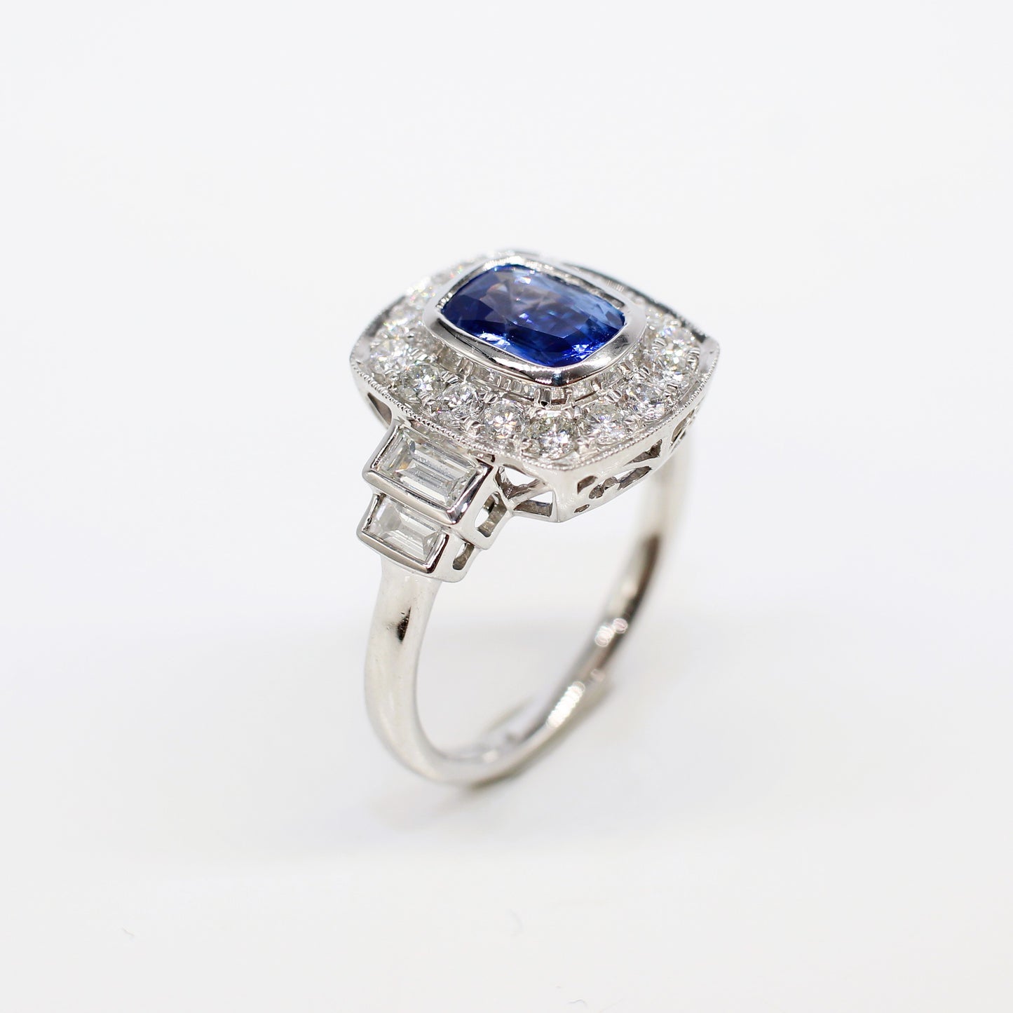 PLATINUM SAPPHIRE & DIAMOND ART DECO HALO RING