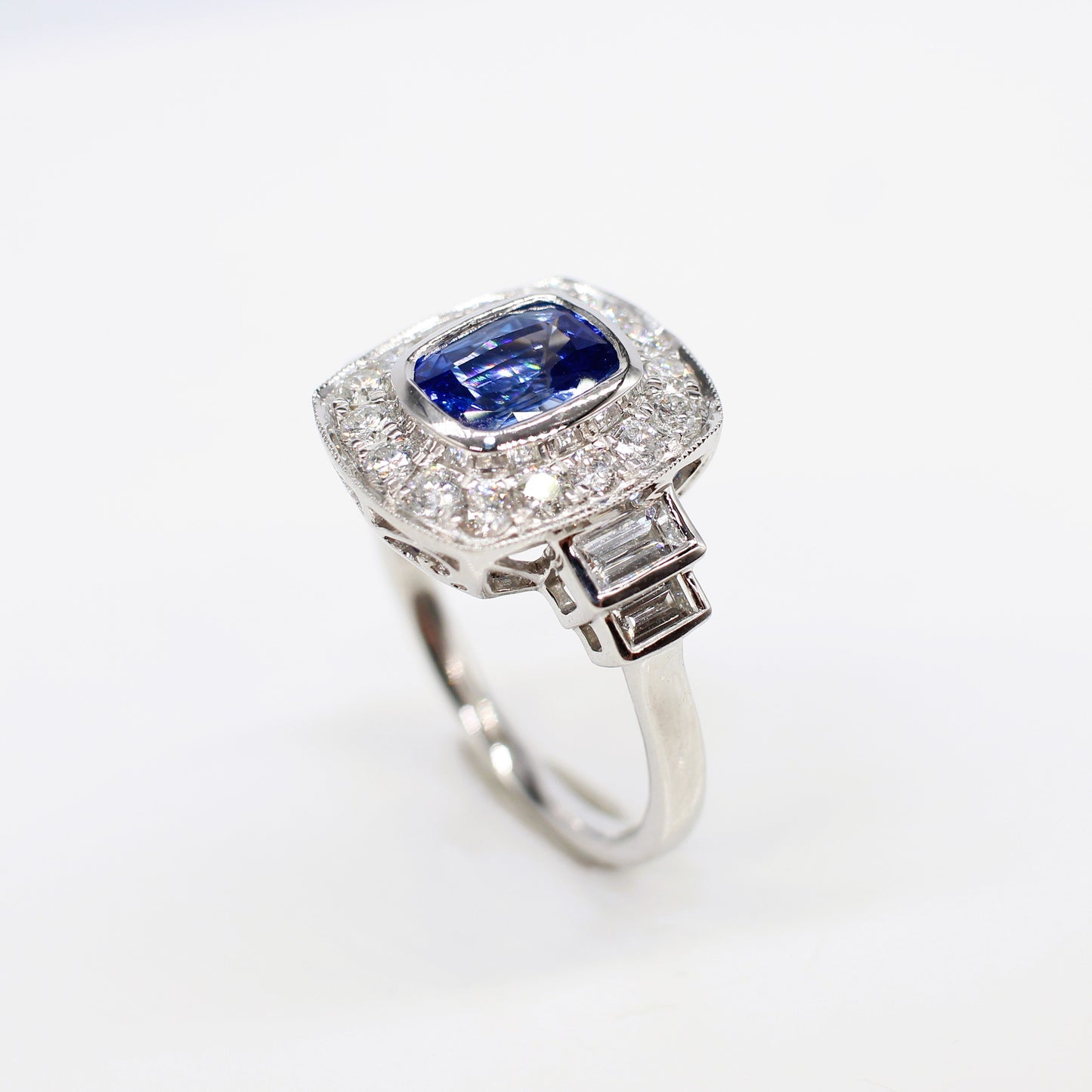 PLATINUM SAPPHIRE & DIAMOND ART DECO HALO RING