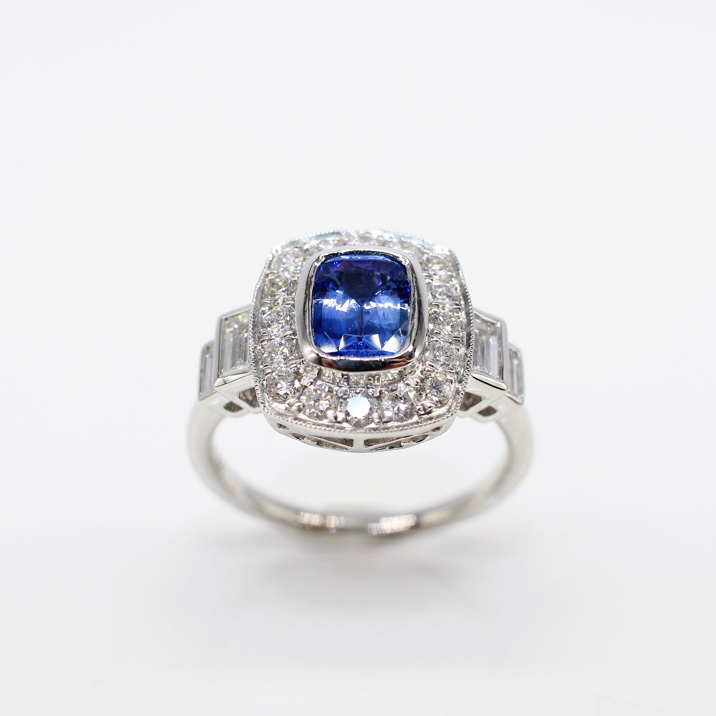PLATINUM SAPPHIRE & DIAMOND ART DECO HALO RING