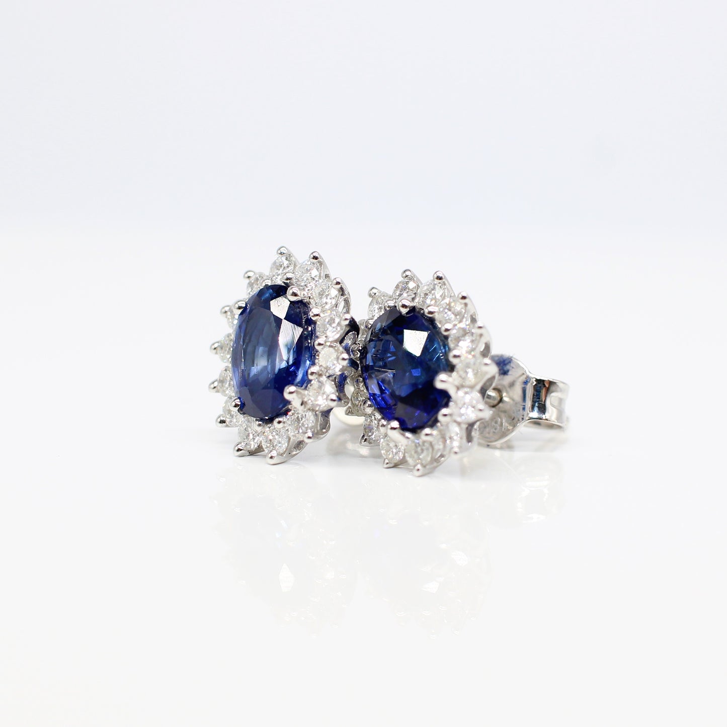 18K SAPPHIRE AND DIAMOND HALO EAR STUDS