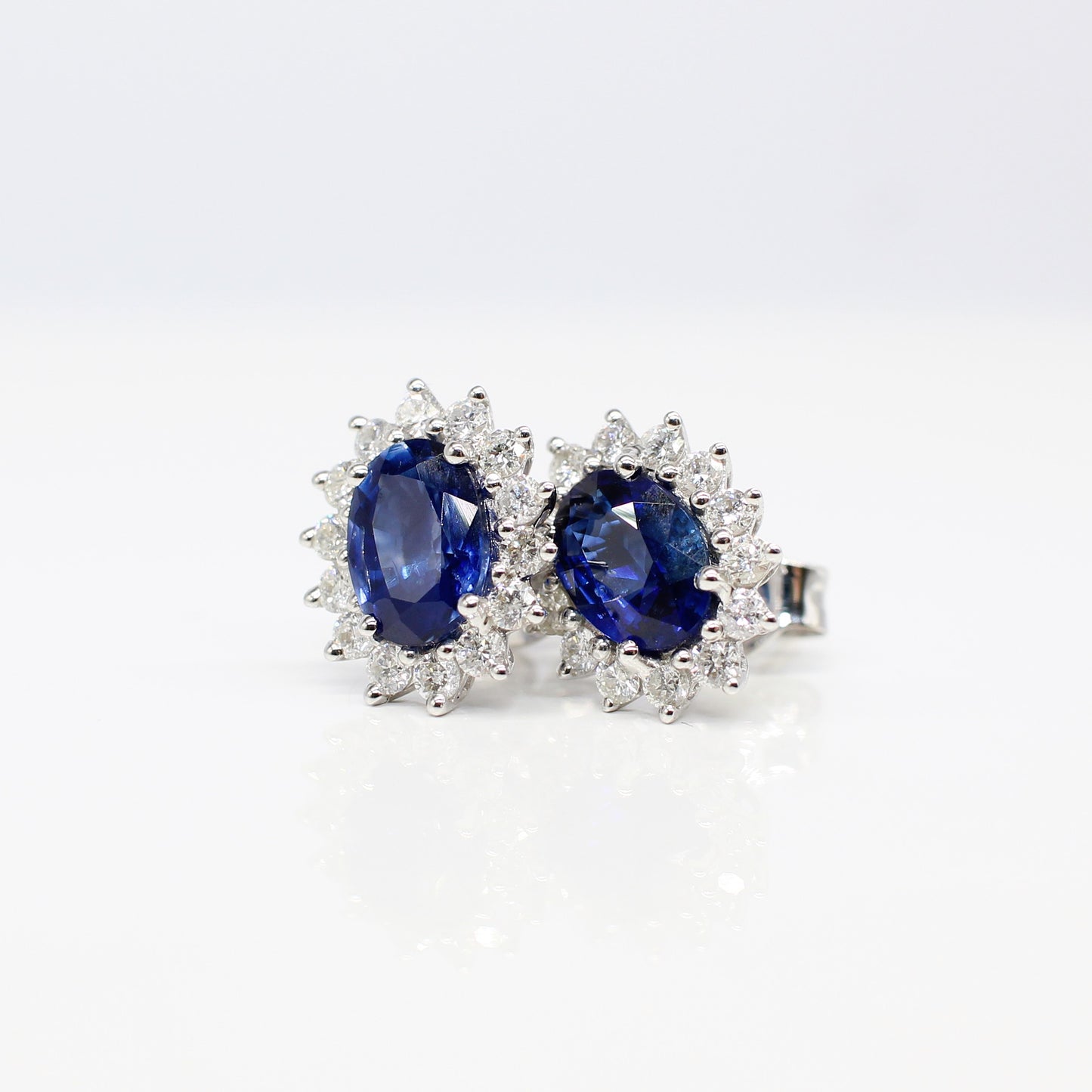 18K SAPPHIRE AND DIAMOND HALO EAR STUDS