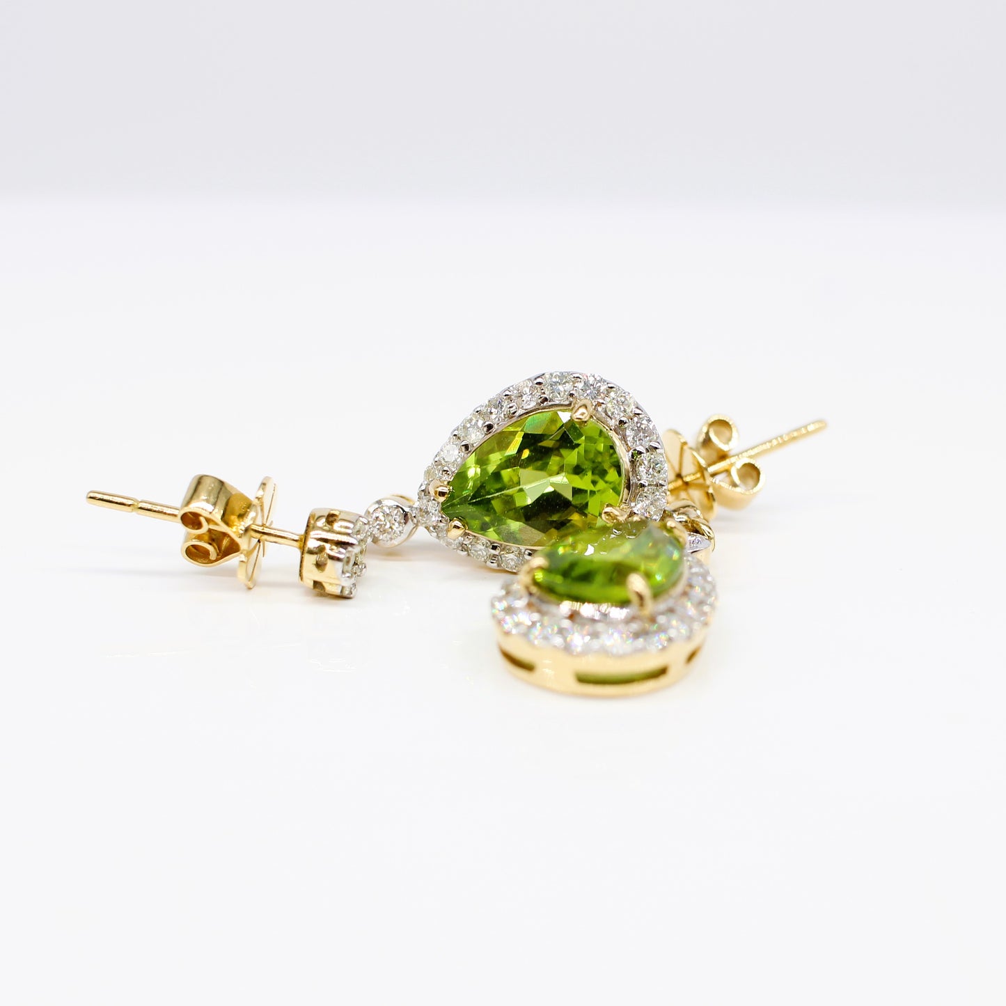 18K DIAMOND AND PERIDOT DROP HALO EARRINGS