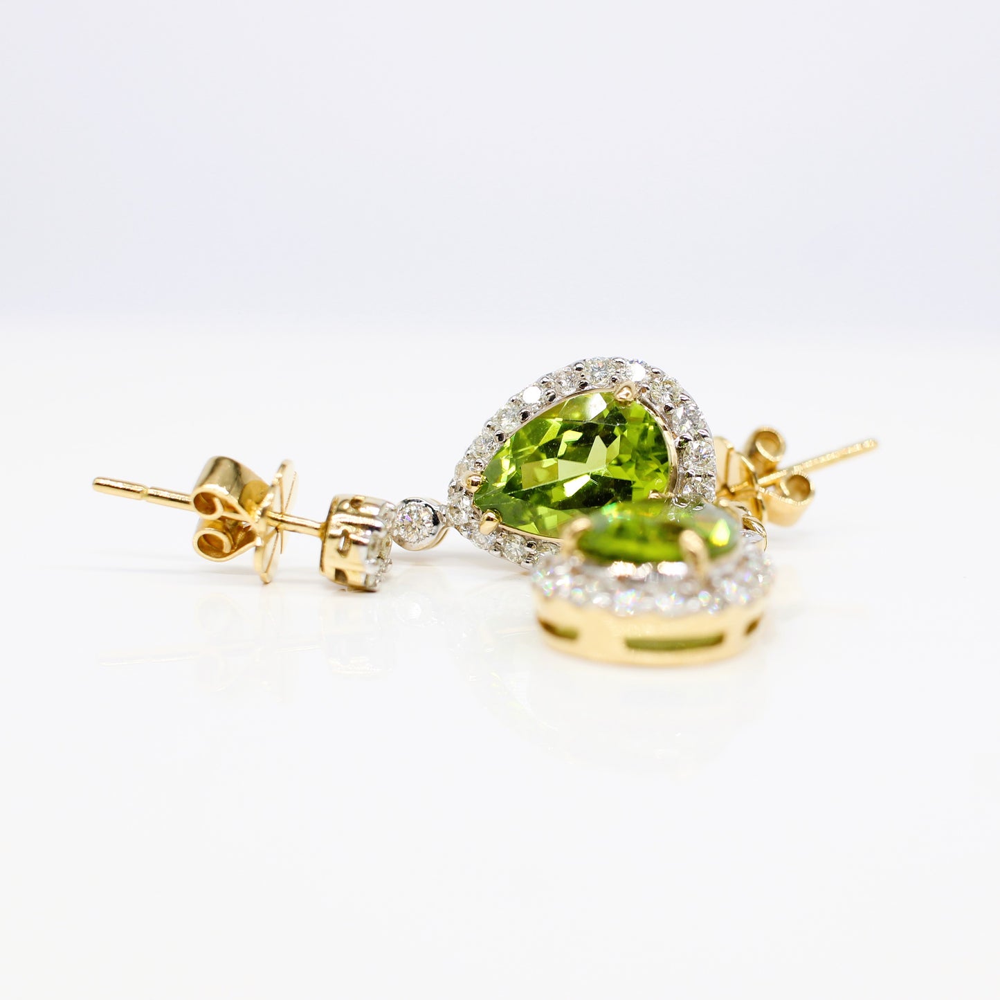 18K DIAMOND AND PERIDOT DROP HALO EARRINGS
