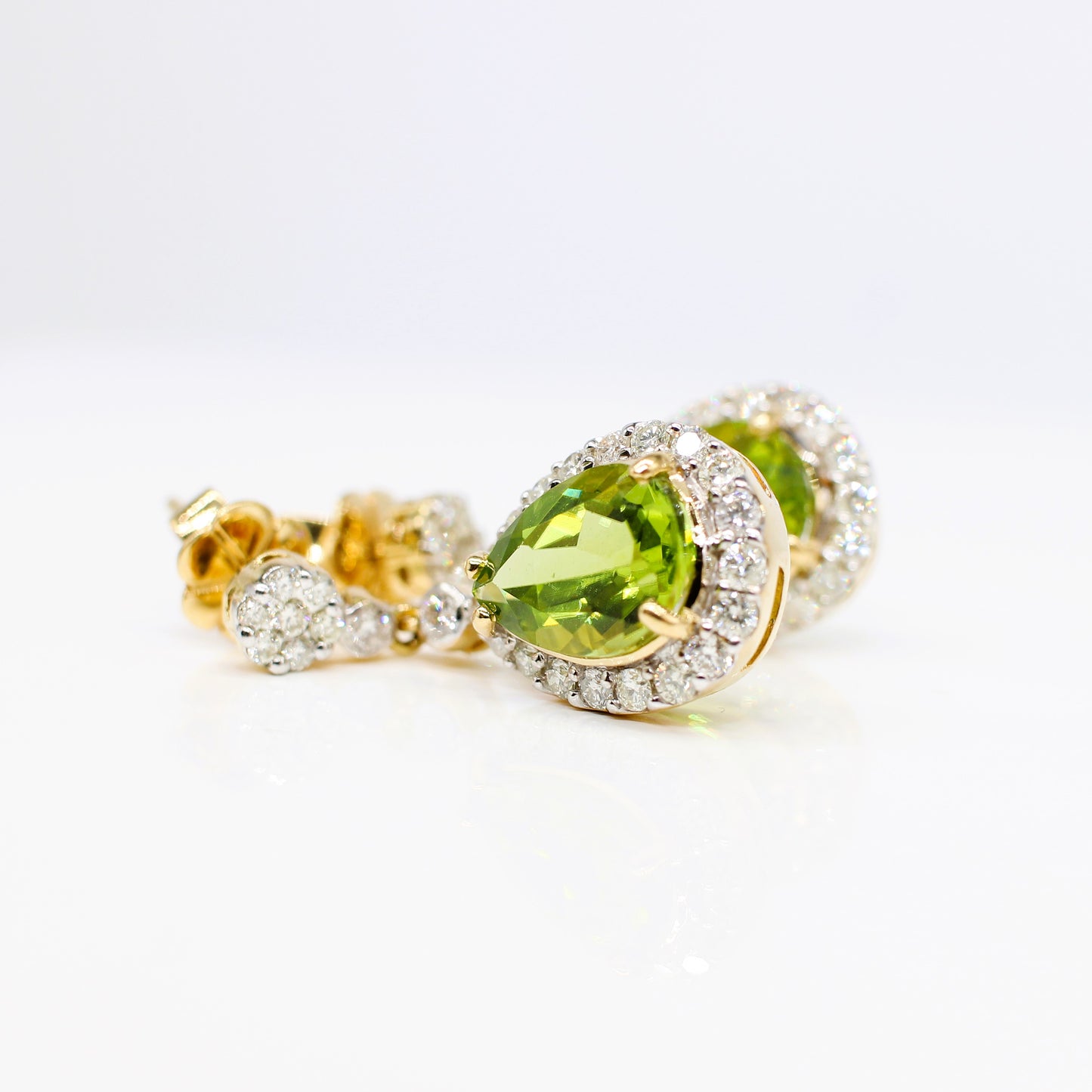 18K DIAMOND AND PERIDOT DROP HALO EARRINGS