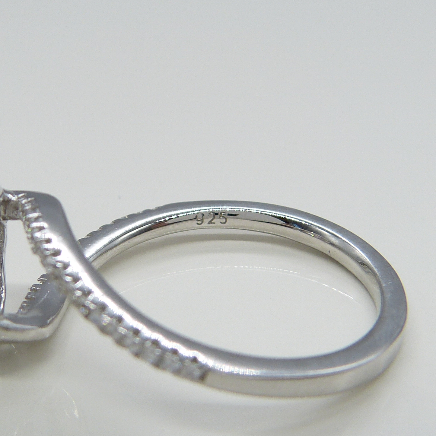 SILVER WARPED SOLITAIRE RING