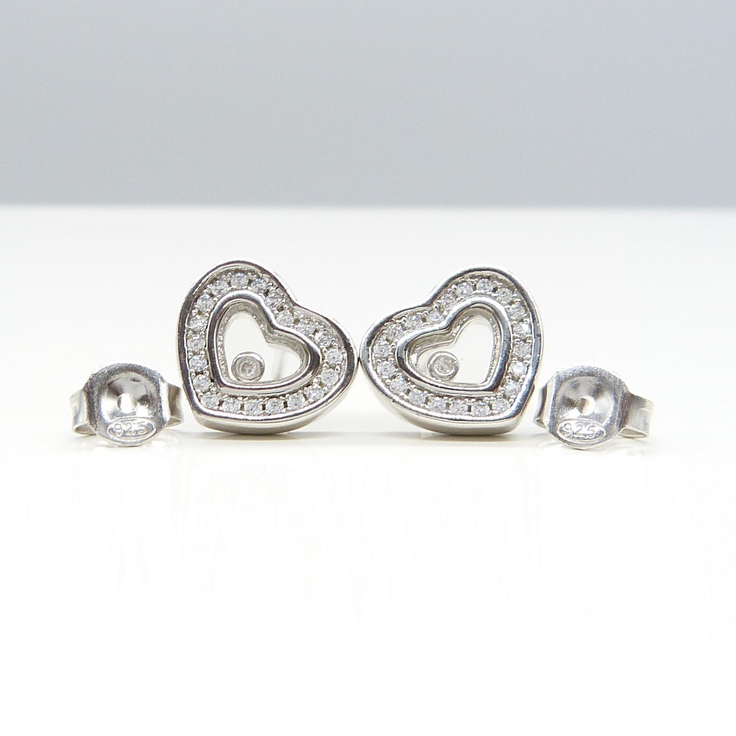 SILVER HEART SHAPED STUDS