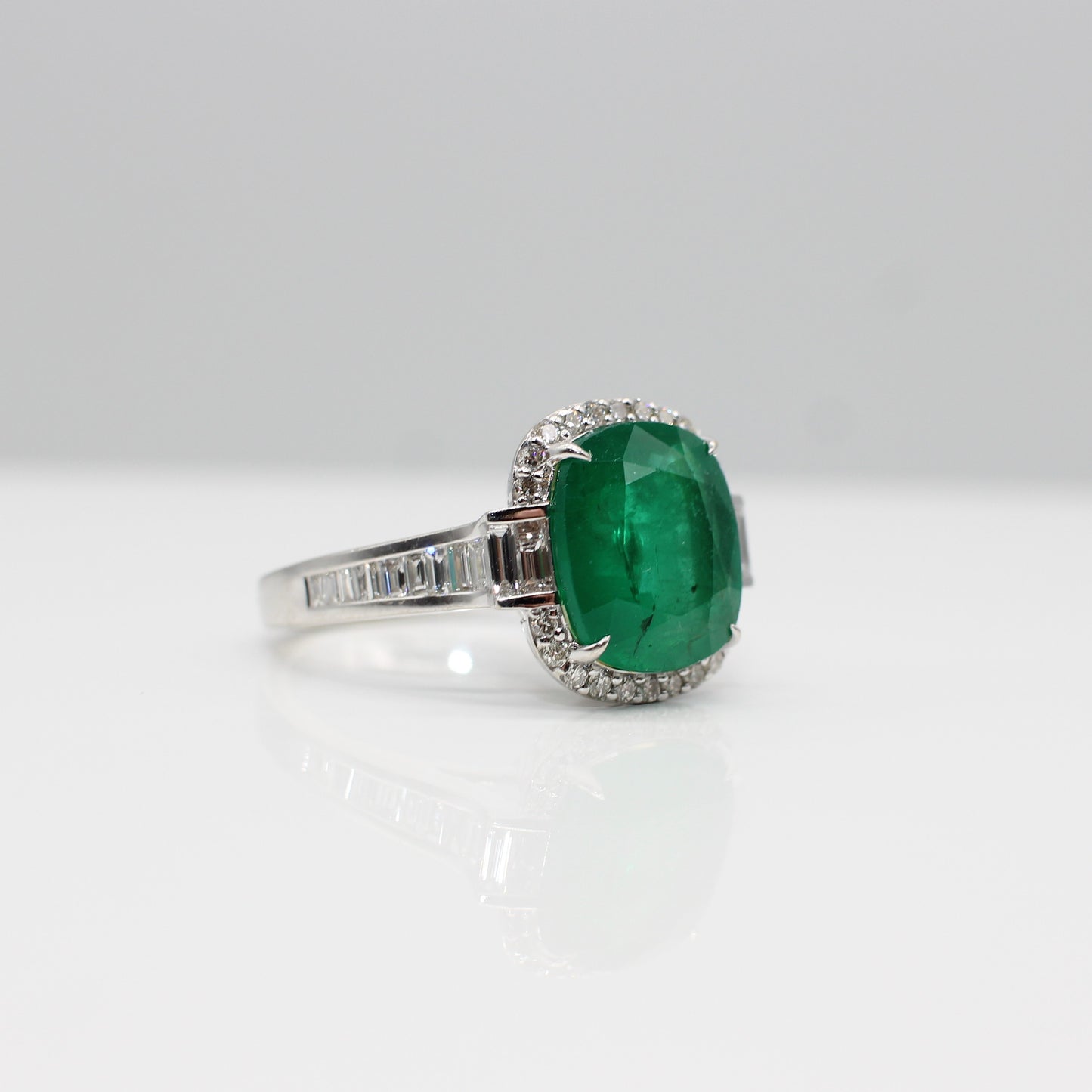 18K EMERALD & DIAMOND HALO RING