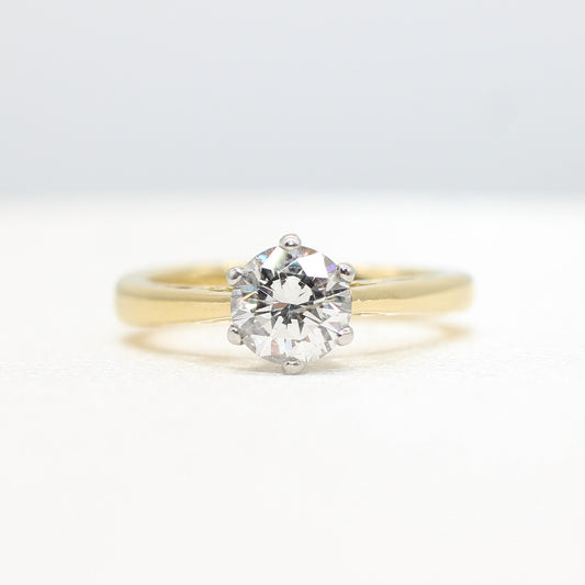 PLATINUM & YELLOW GOLD COLOURLESS 0.64CT DIAMOND SOLITAIRE RING
