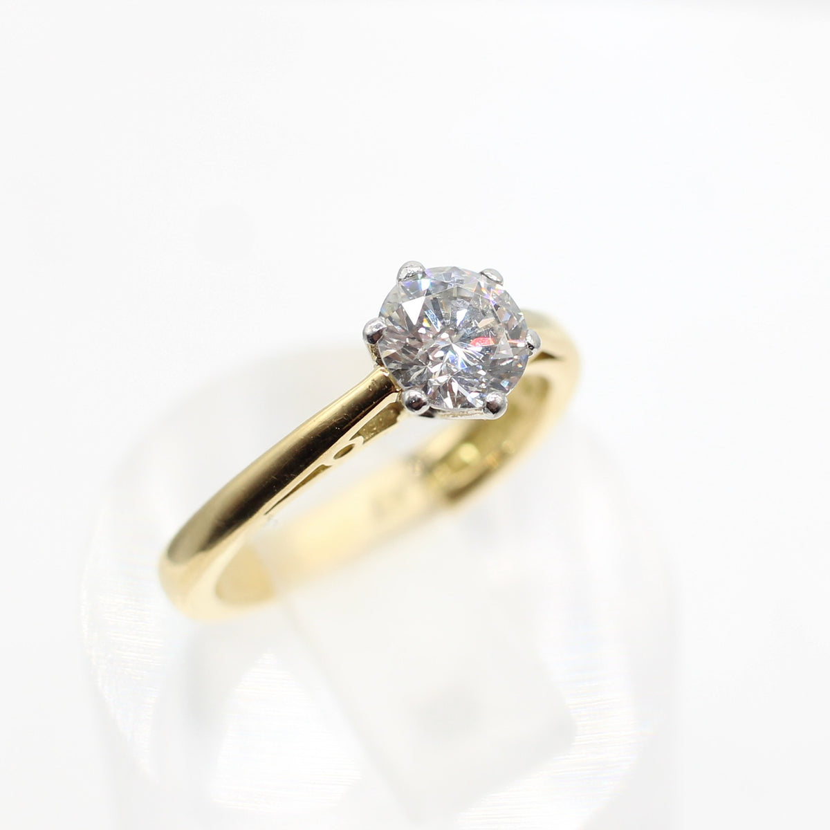 PLATINUM & YELLOW GOLD COLOURLESS 0.64CT DIAMOND SOLITAIRE RING
