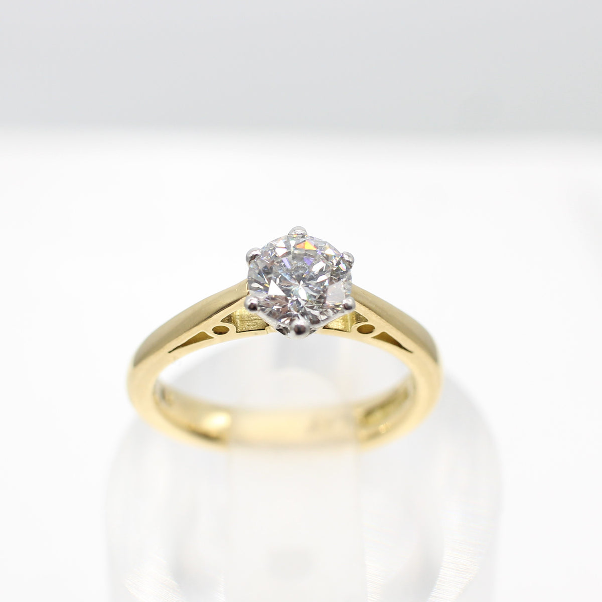 PLATINUM & YELLOW GOLD COLOURLESS 0.64CT DIAMOND SOLITAIRE RING